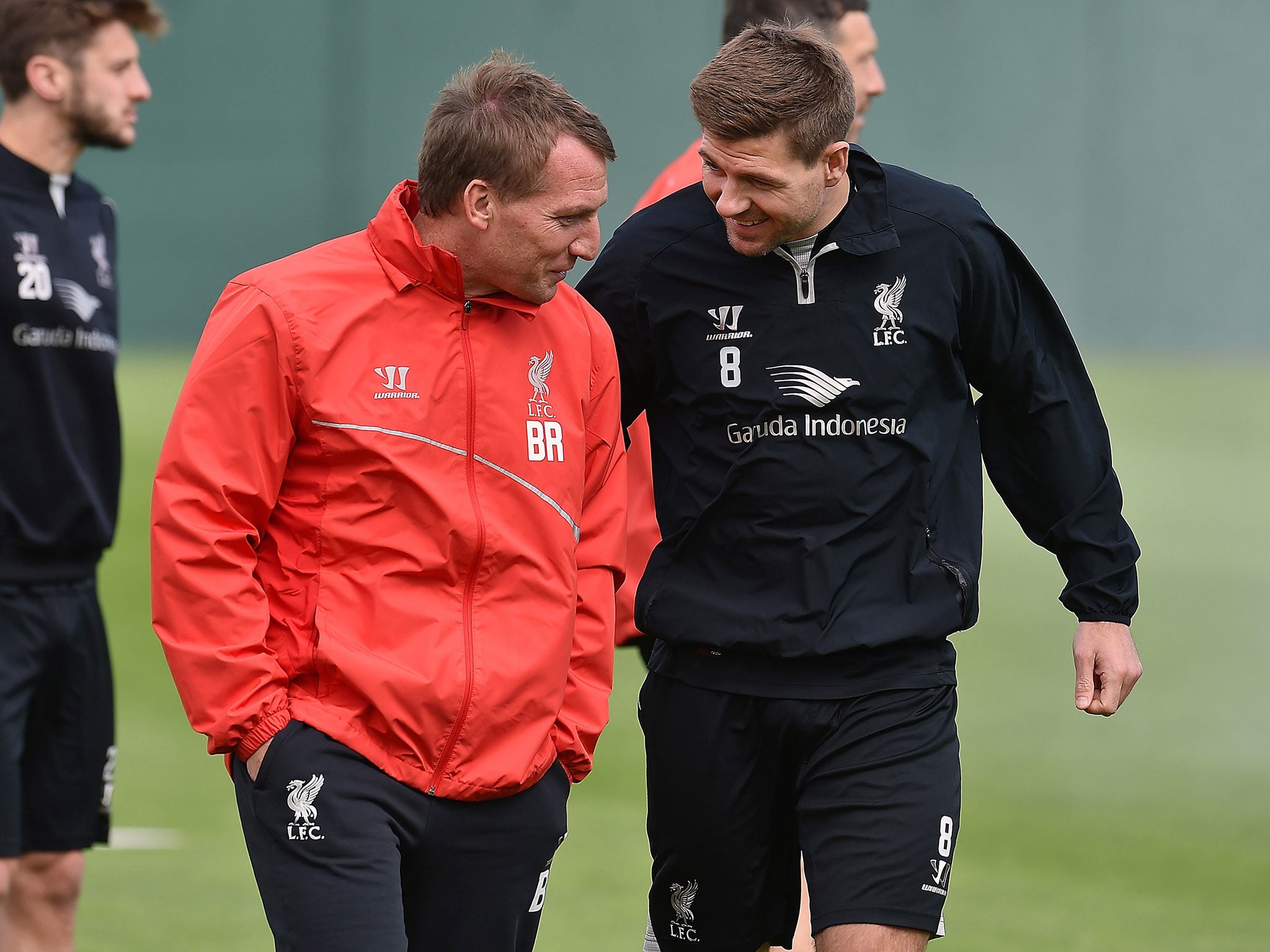 Brendan Rodgers shares a joke with Steven Gerrard