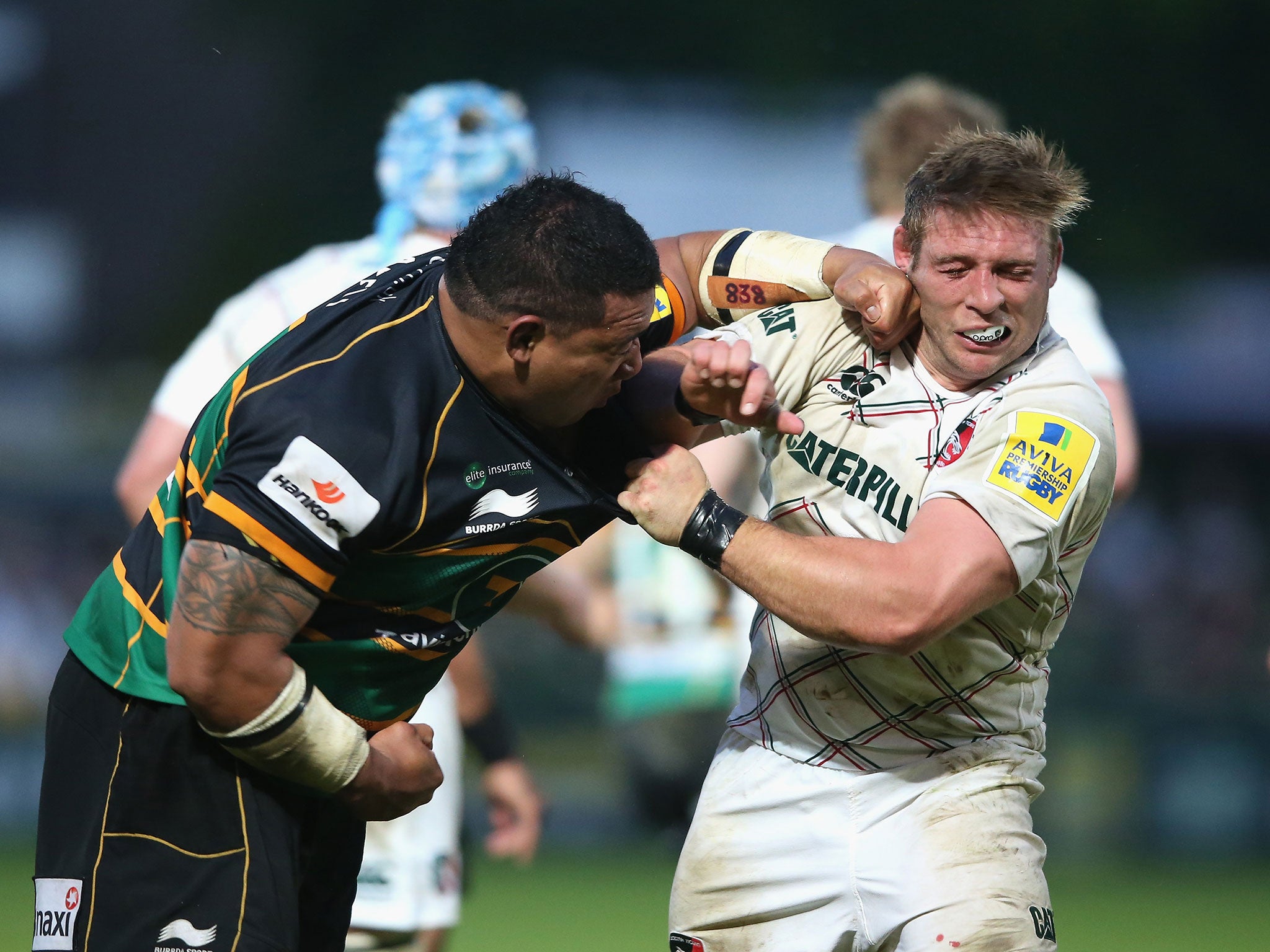 Salesi Ma'afu of Northampton hits Leicester hooker Tom Youngs