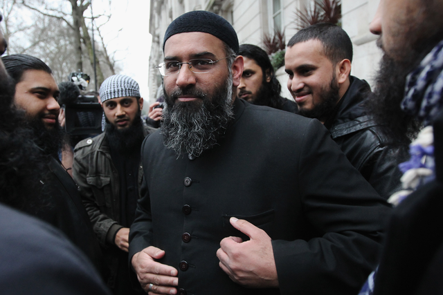 Anjem Choudary leaves a press conference in Millbank Studios in 2010 