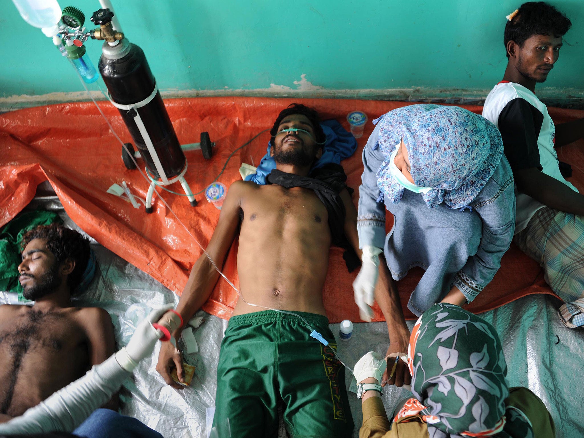 Rescued migrants receive medical treatment in Kuala Langsa