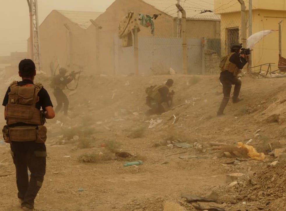 The last remaining Iraqi security forces defending their headquarters against Isis in the eastern part of Ramadi on 14 May