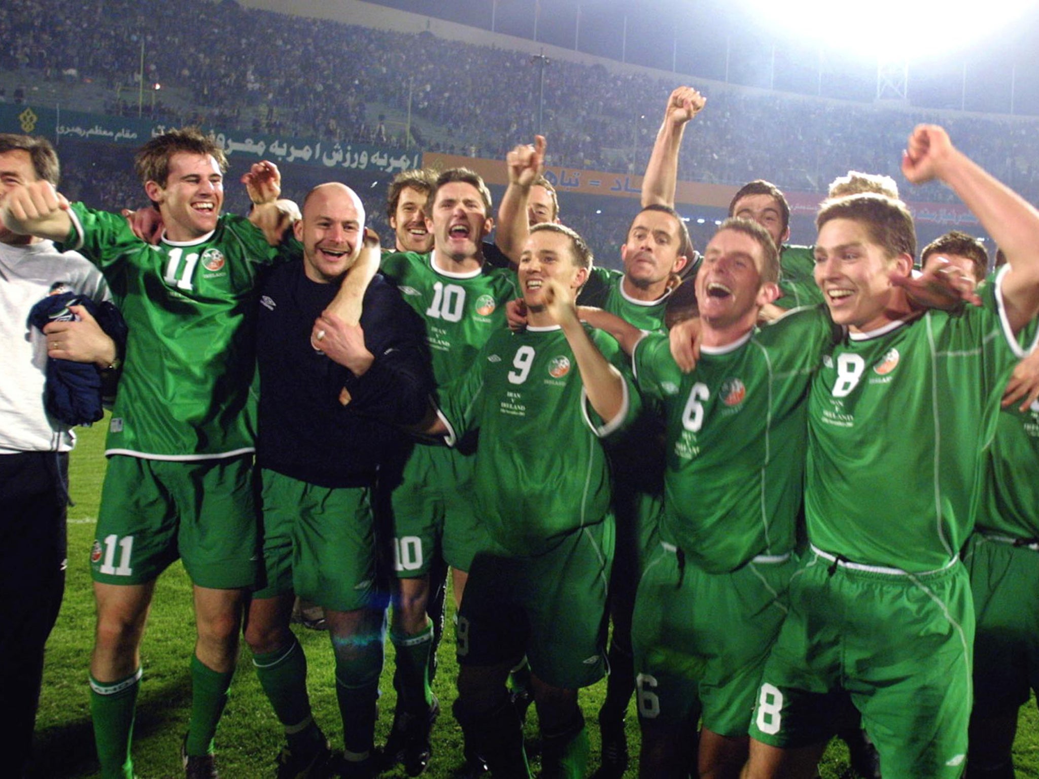 Irish players celebrate after qualifying for the World Cup in a play-off in Tehran