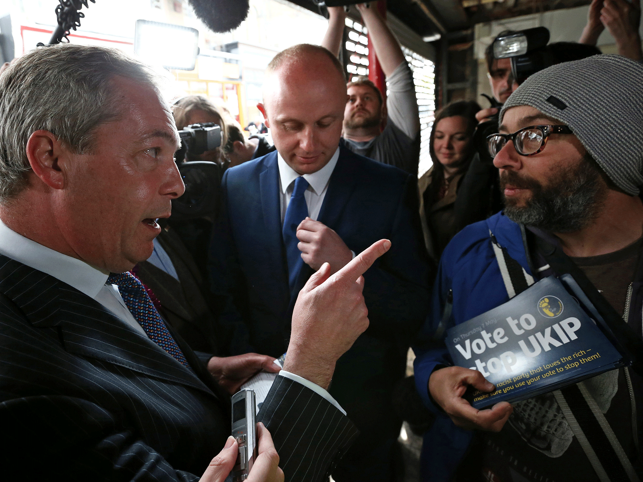 Nigel Farage argues with an anti-Ukip protester in Ramsgate during the election campaign