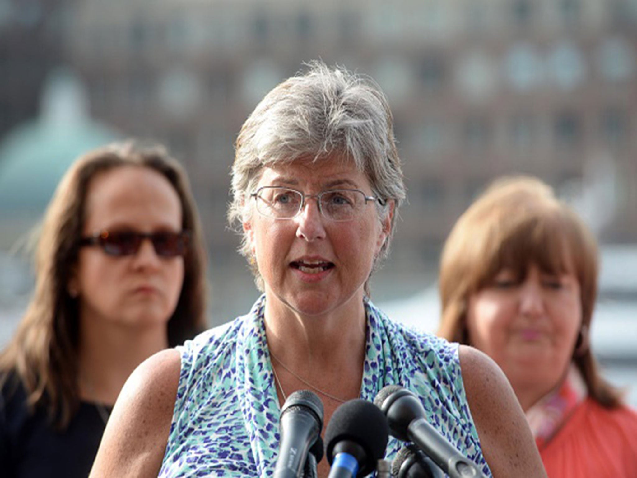 Bombing victim Karen Brassard speaks to the media outside the John Joseph Moakley United States Courthouse