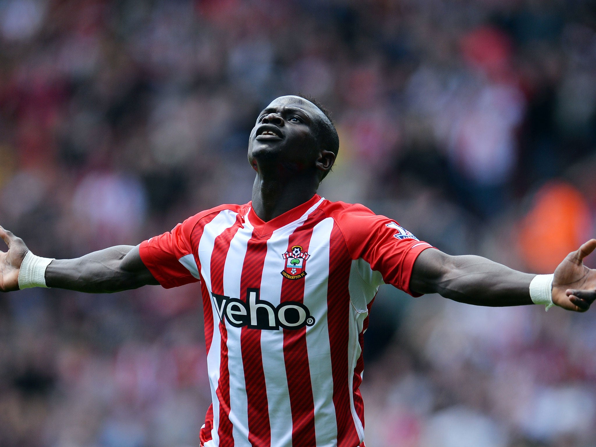 Sadio Mane celebrates netting the fastest hat-trick in Premier League history back in May