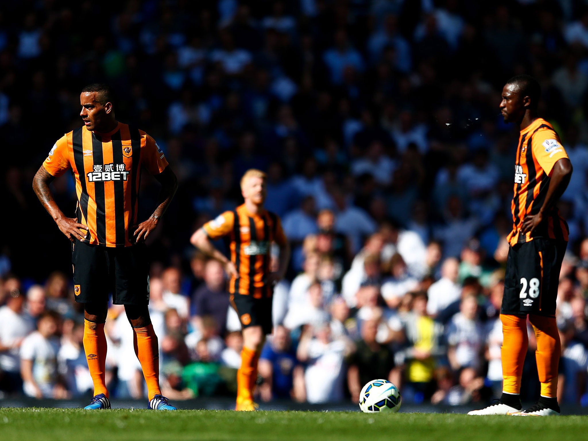 Hull players react to conceding a goal