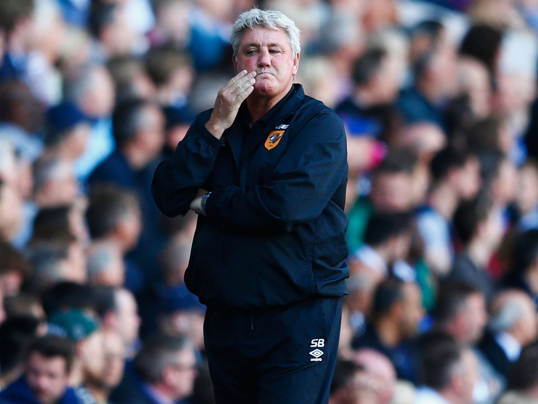 Steve Bruce grimaces during the defeat to Spurs