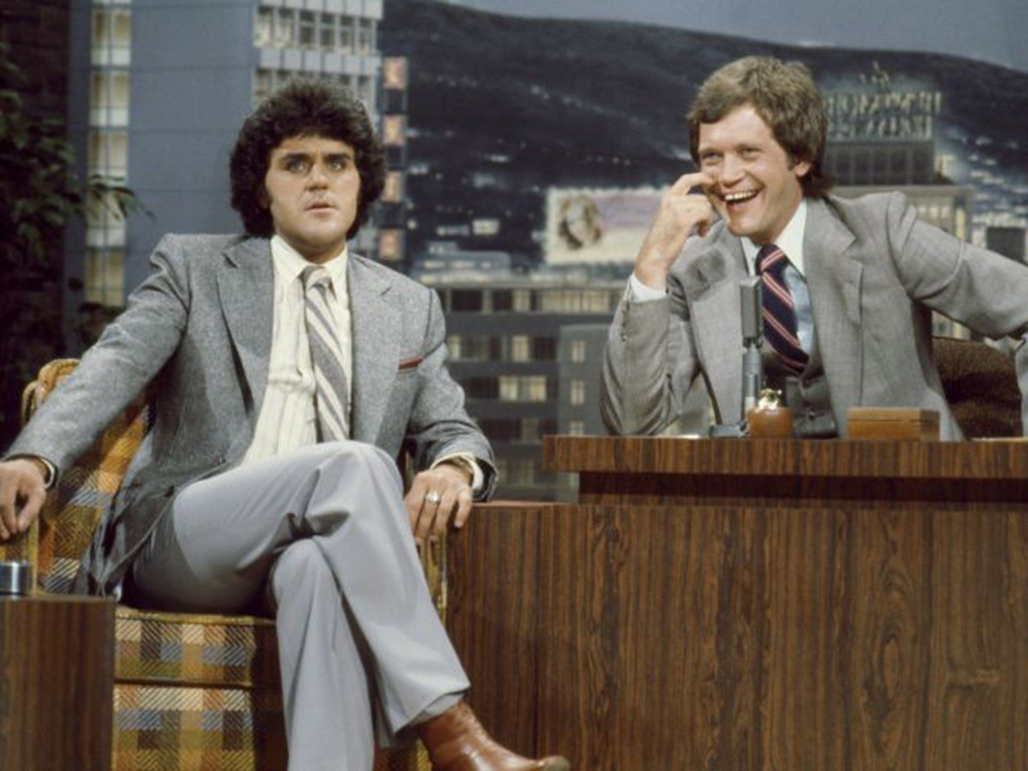 Jay Leno, left, hosted by David Letterman on The Tonight Show in 1979