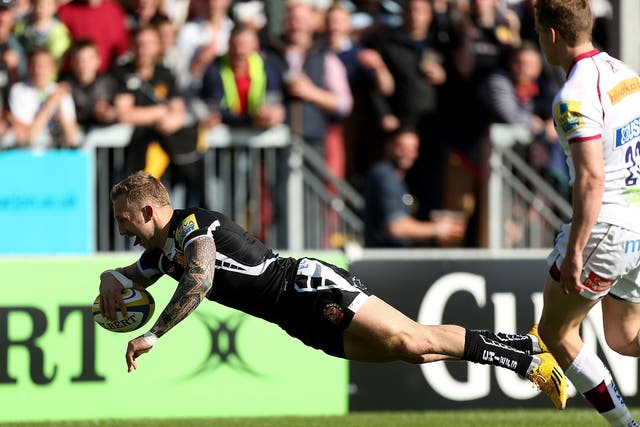 Max Boddily dives over for a try for Exeter Chiefs