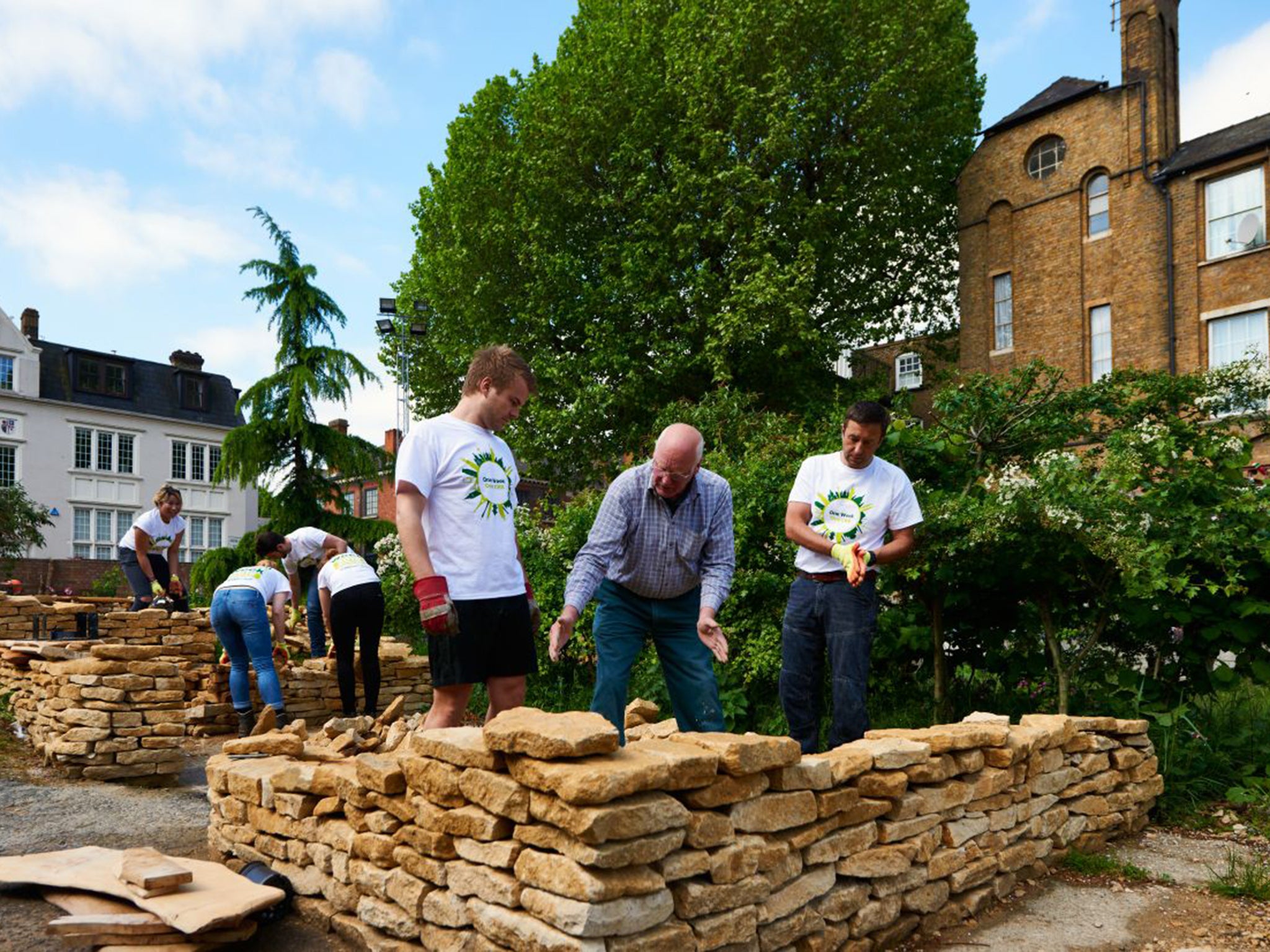John Holt, centre, teaches the craft of dry-stone walling