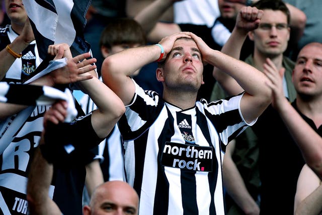 A Newcastle fan on the final day of the season in 2009