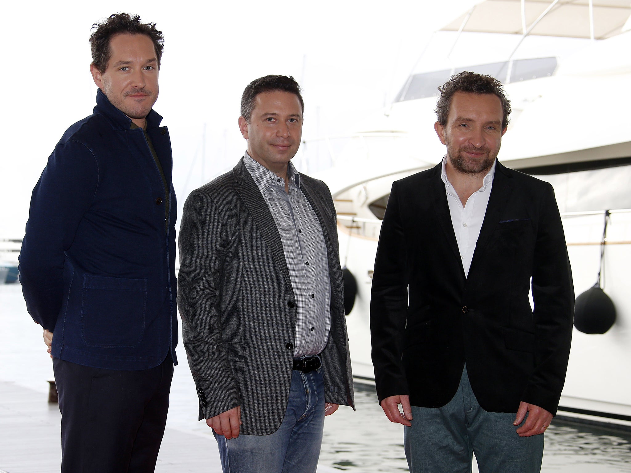 British actor Bertie Carvel, producer Nick Hirschkorn and actor Eddie Marsan pose during a photocall for the TV series 'Jonathan Strange & Mr Norrell'