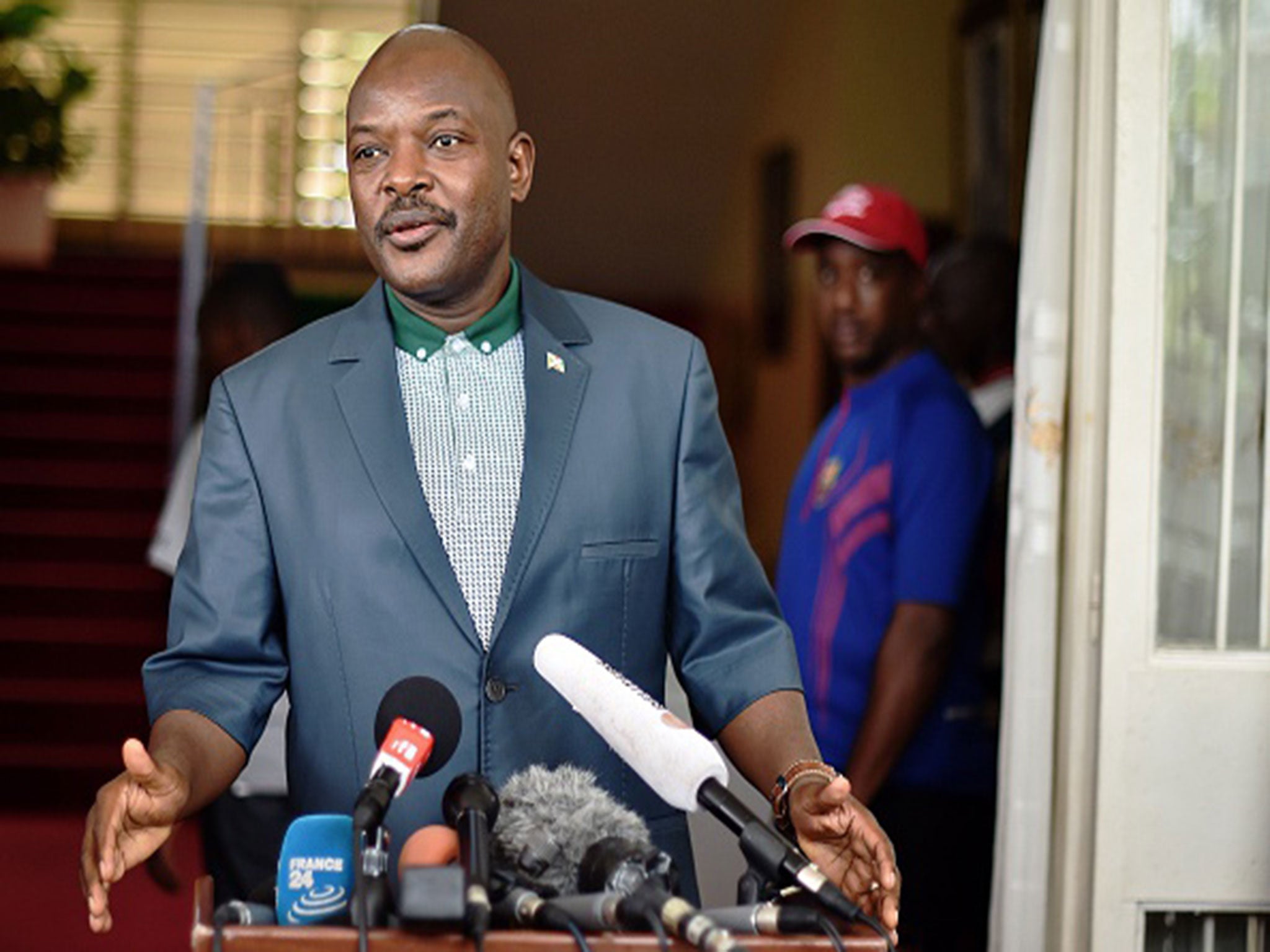 Burundi's President Pierre Nkurunziza talks to the media at the President's office in Bujumbura