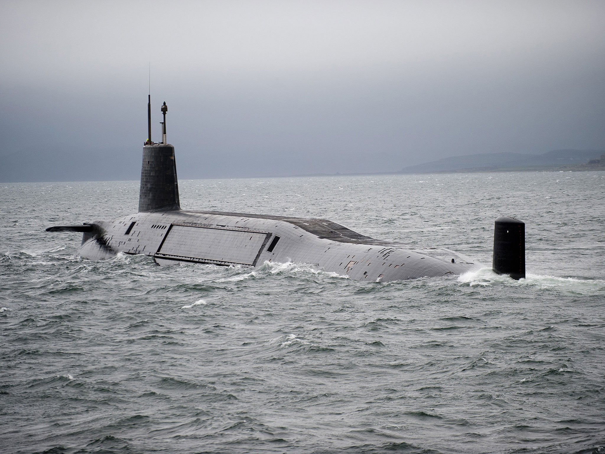 File: In this handout image provided by the MoD, HMS Vengeance departs for Devonport prior to re-fit on Ferbruary 27, 2012 off the coast of Largs, Scotland