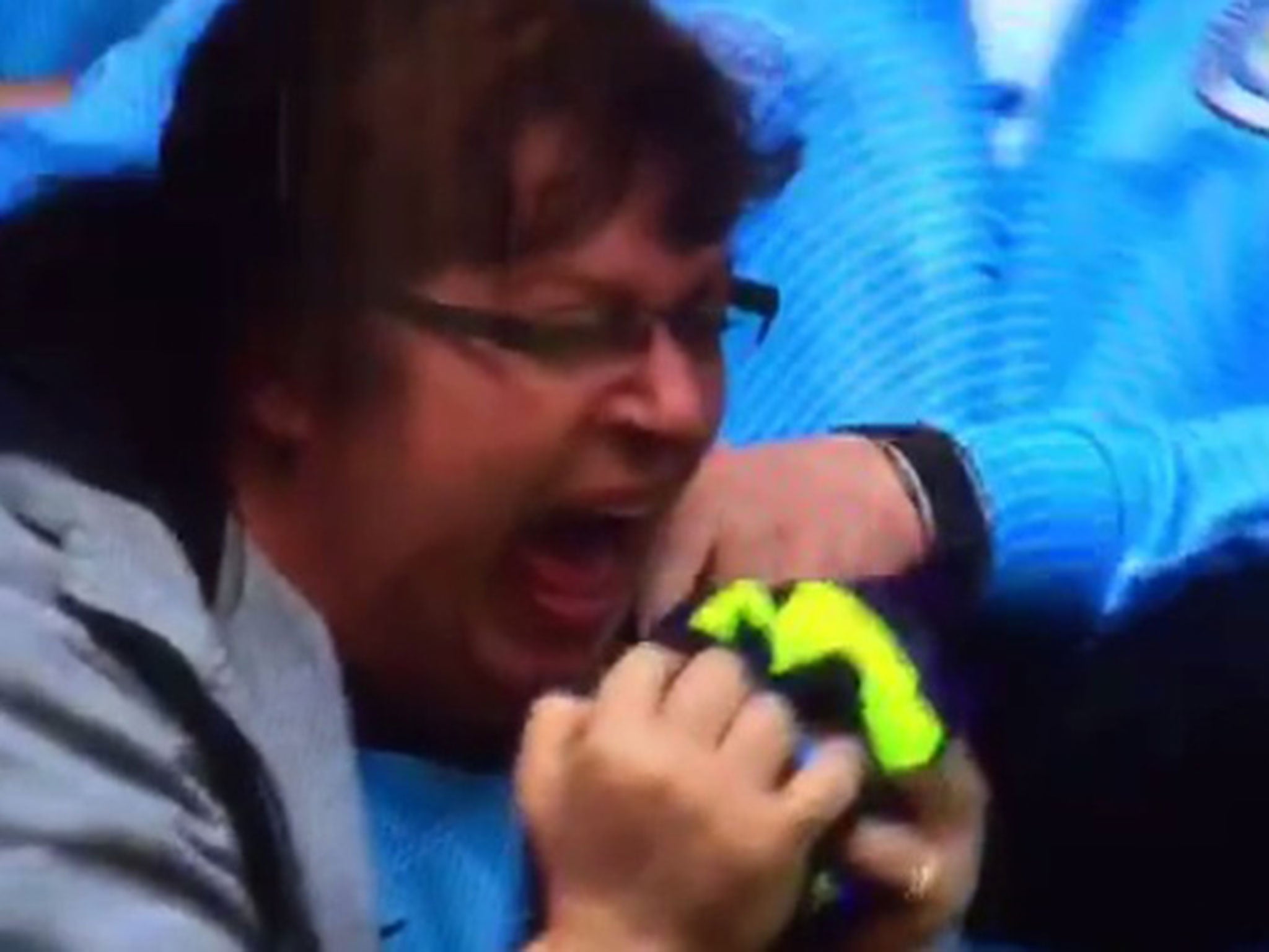 The supporter cannot contain herself after being given Pablo Zabaleta's shirt