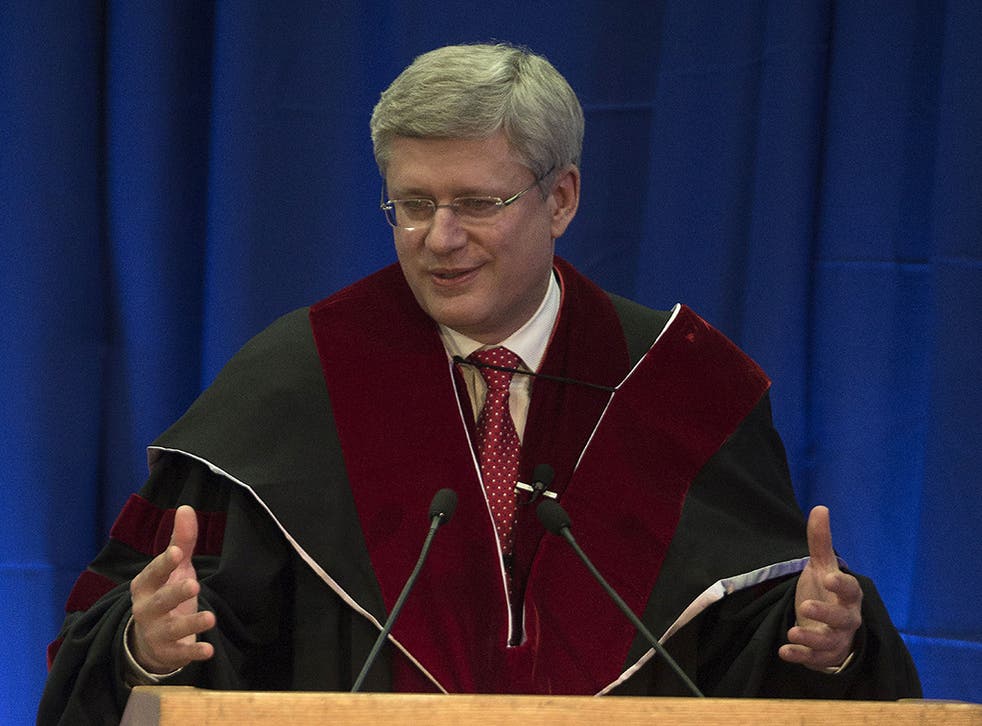 Canadian Prime Minister Stephen Harper gives a speech after being presented with an honorary doctorate from the Tel Aviv University by Tel Aviv University President, Prof. Yosef Klafter (unseen) on January 22, 2014