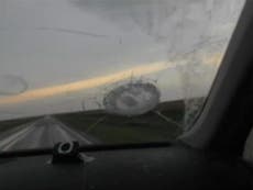 Baseball-sized hail stones smash car windscreen during massive