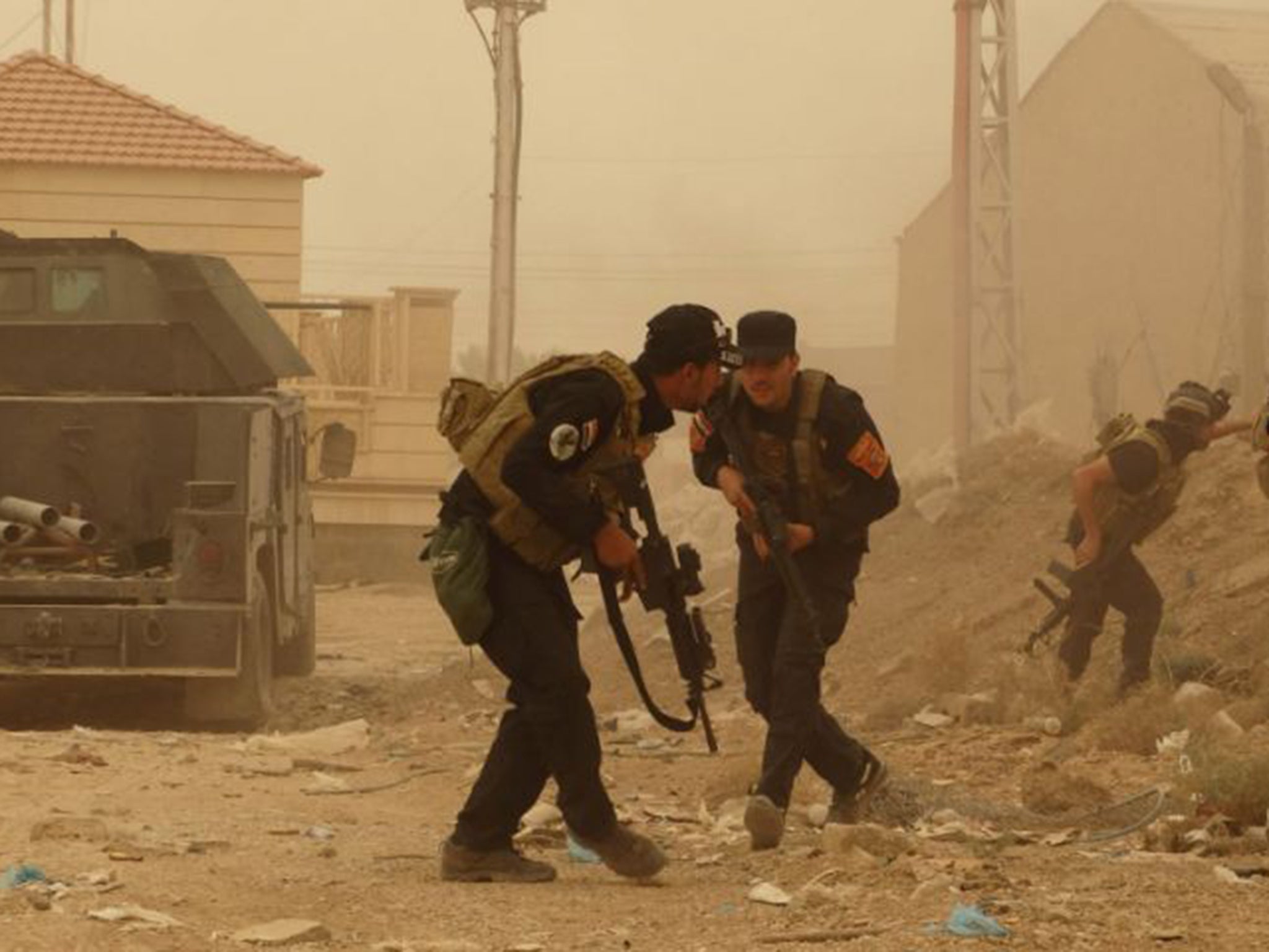 Iraqi government security forces battle Isis fighters in Ramadi, shortly before the capital of Anbar province, 70 miles from Baghdad, fell to the Islamists