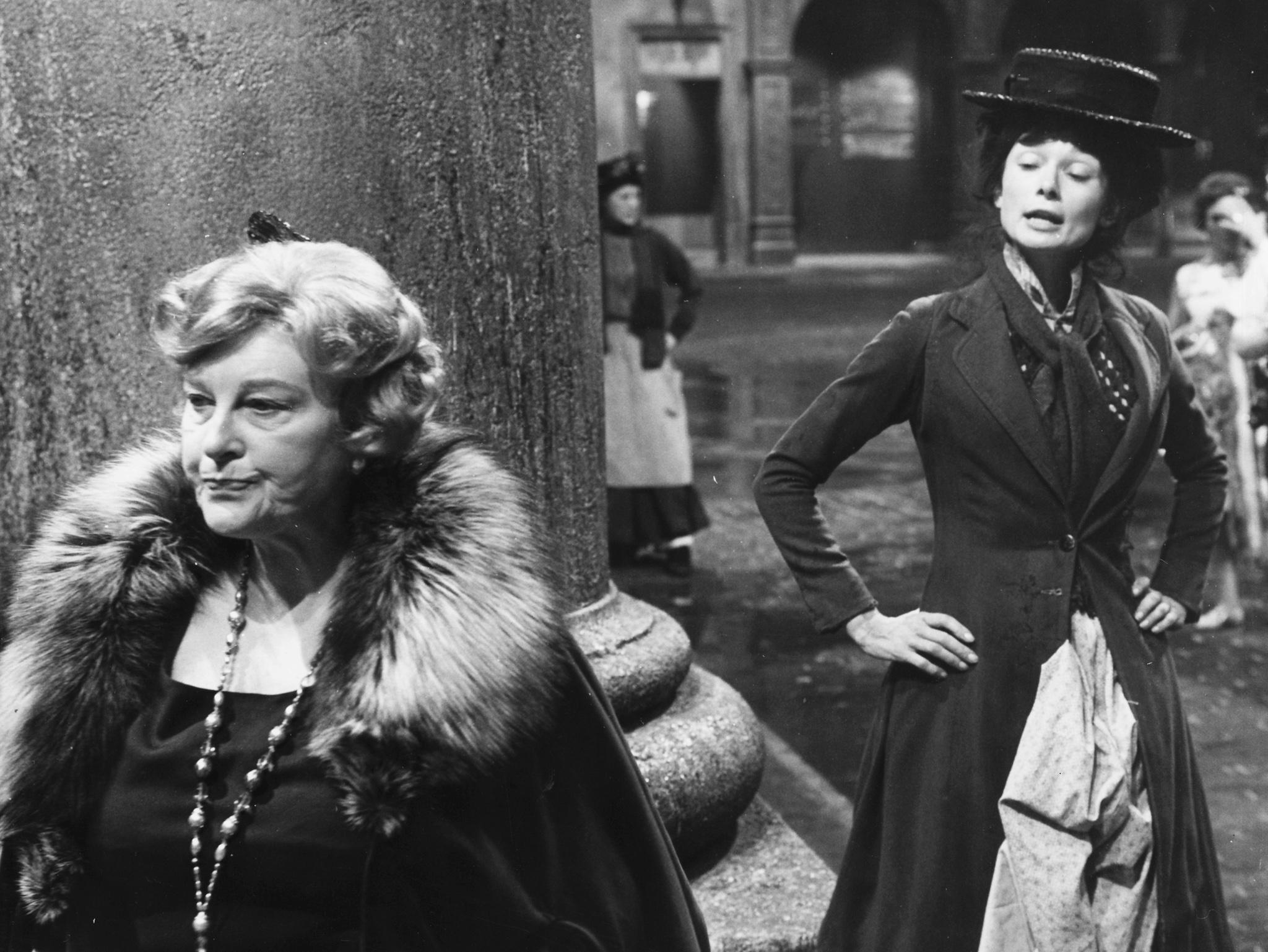 Isobel Elsom (left) and Audrey Hepburn in a scene from the film 'My Fair Lady', 1964