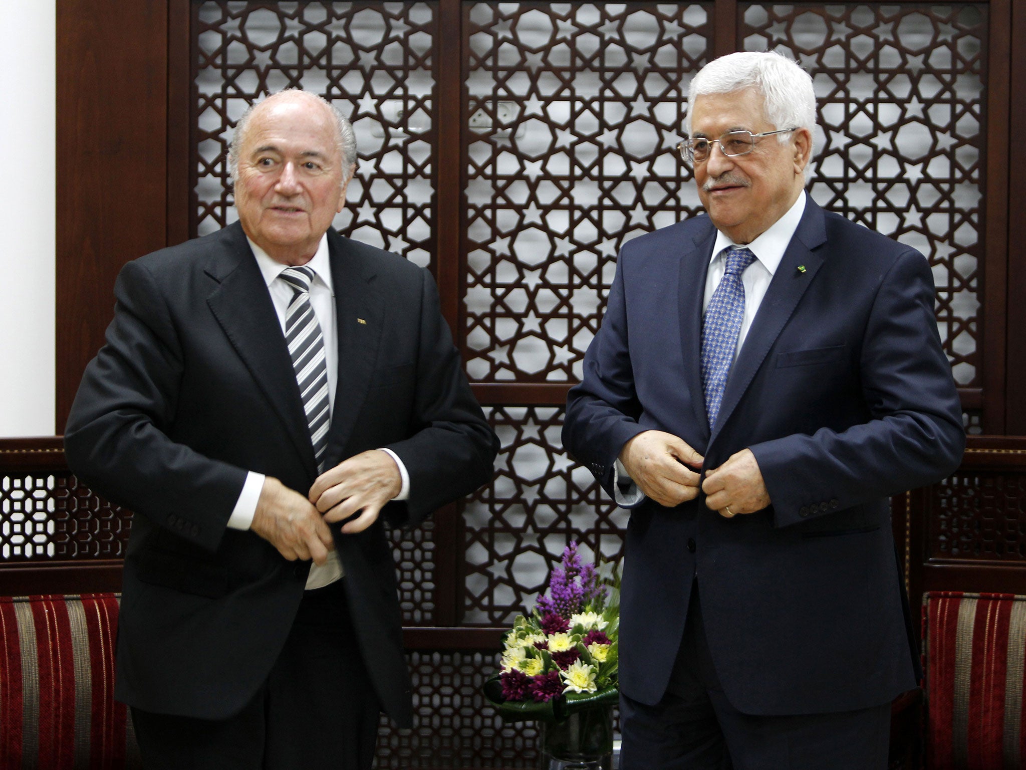 Blatter alongside Palestinian President Mahmour Abbas