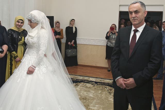 Kheda Goilabiyeva, 17, marries police chief Nazhud Guchigov in Grozny on Saturday in what some claim is a forced marriage