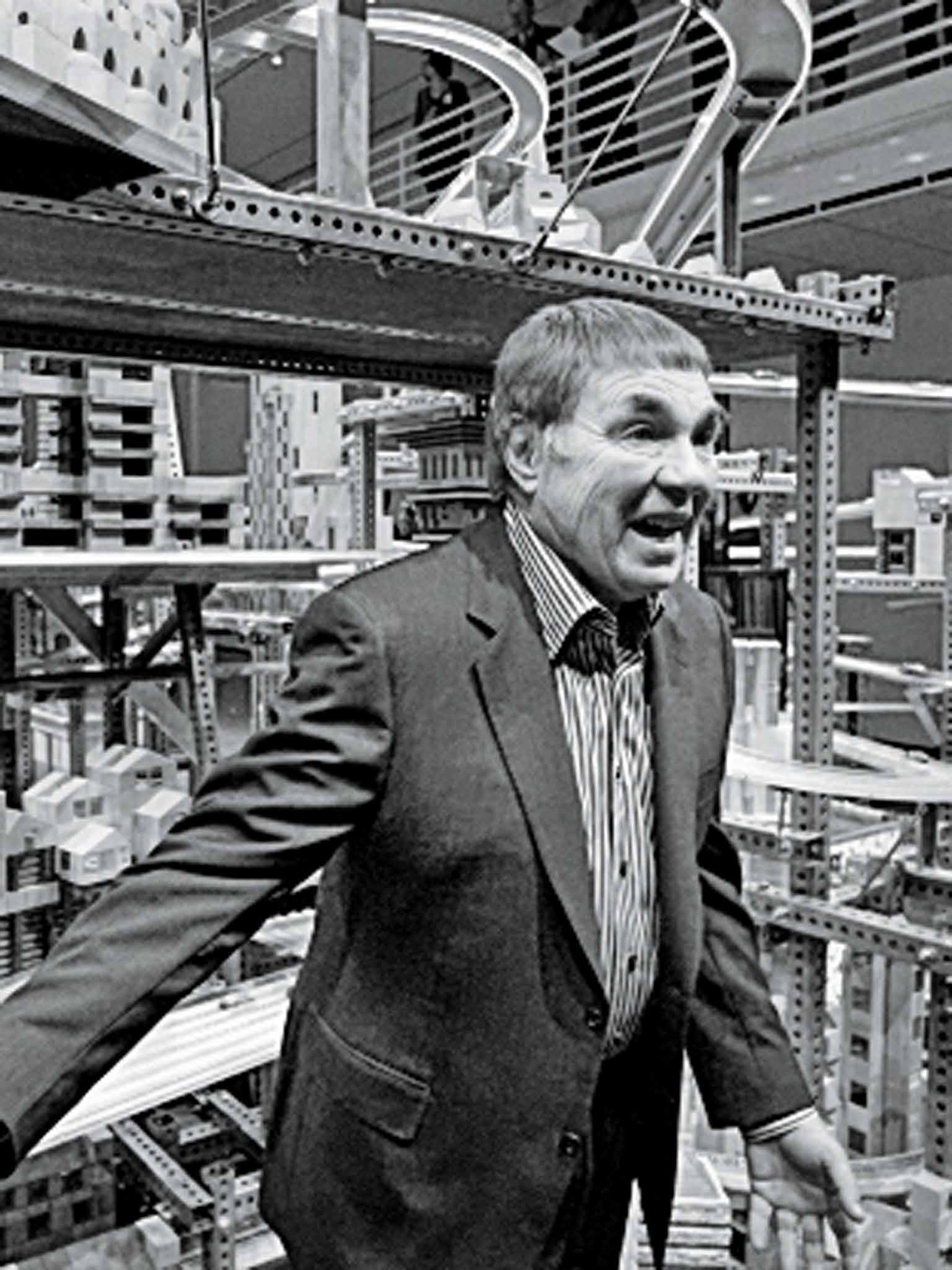 Burden in 2012 in front of his piece 'Metropolis II', which envisages a city of the future
