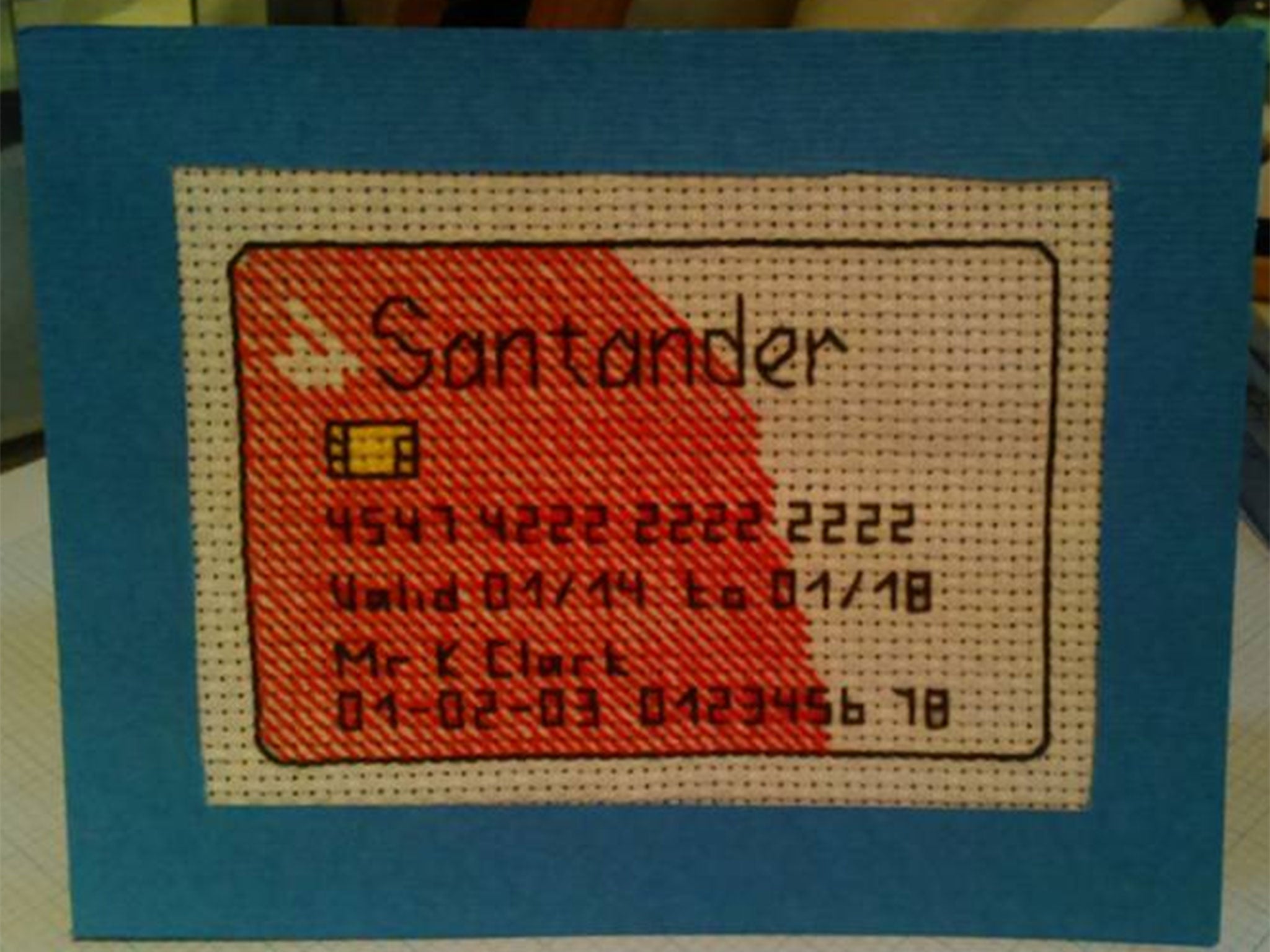 Londoner Keith Clark cross-stitched his own Santander bank card after the bank took too long to send him a real one