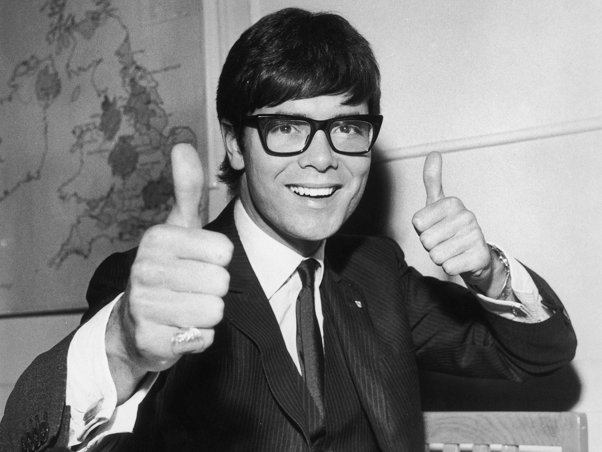 Cliff Richard gives a thumbs up after finding out he will represent the UK at the Eurovision Song Contest