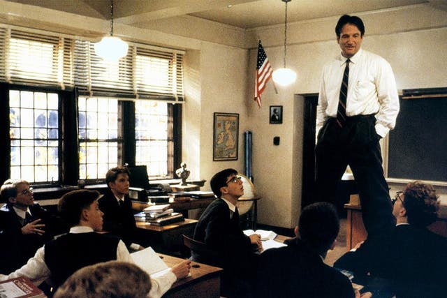 'Oh me! Oh life!': Robin Williams plays maverick teacher John Keating, who uses poetry to inspire his students to follow their dreams