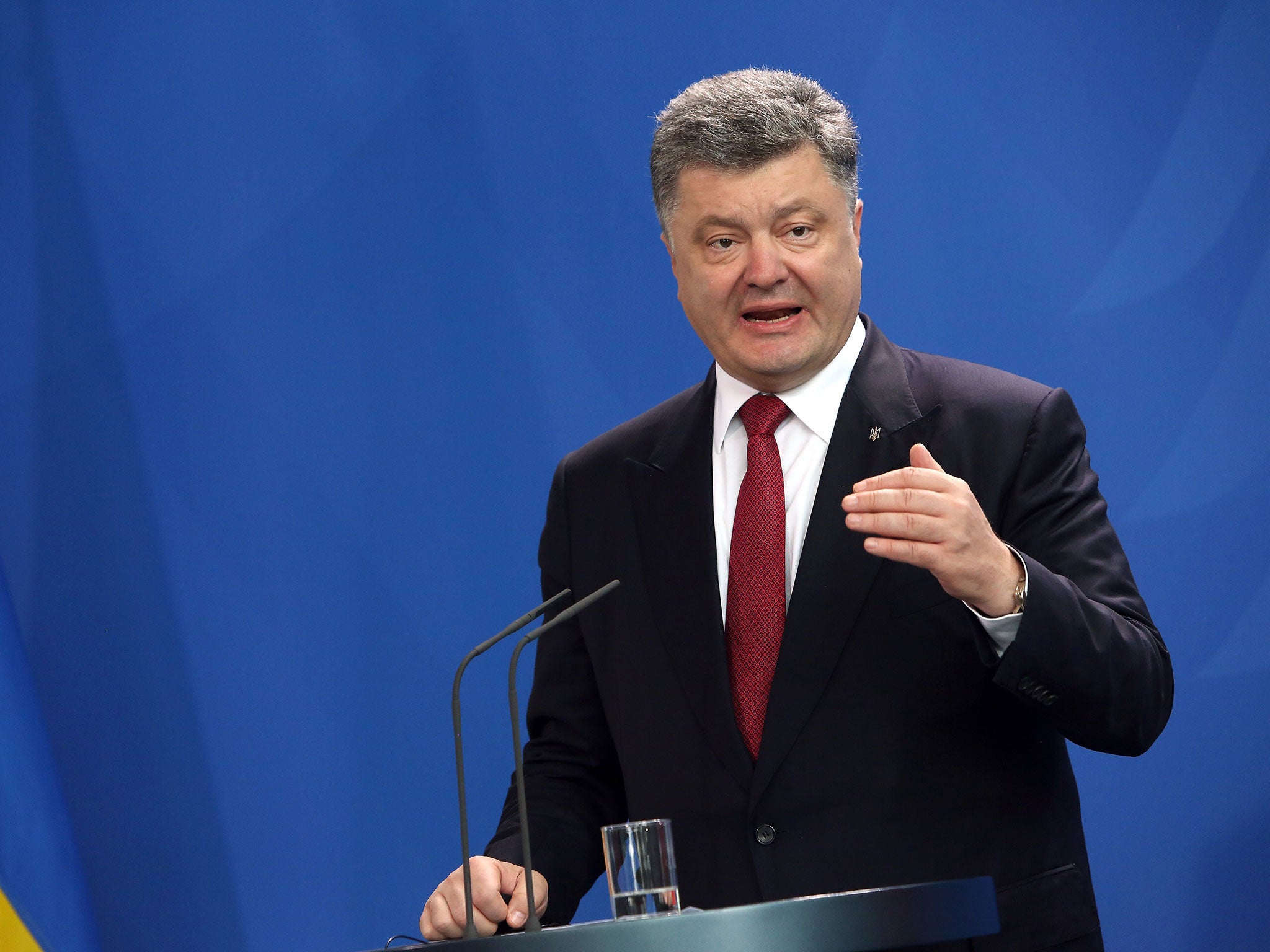 Ukrainian President Petro Poroshenko gives a joint statement to the press with the German chancellor at the chancellery in Berlin on May 13, 2015.