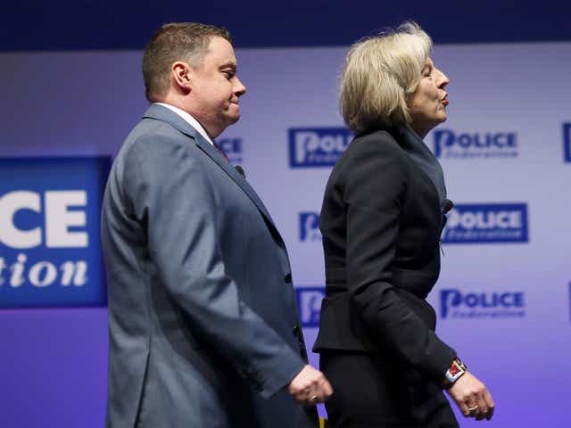 Theresa May and Steve White arrive at the Police Federation’s conference 