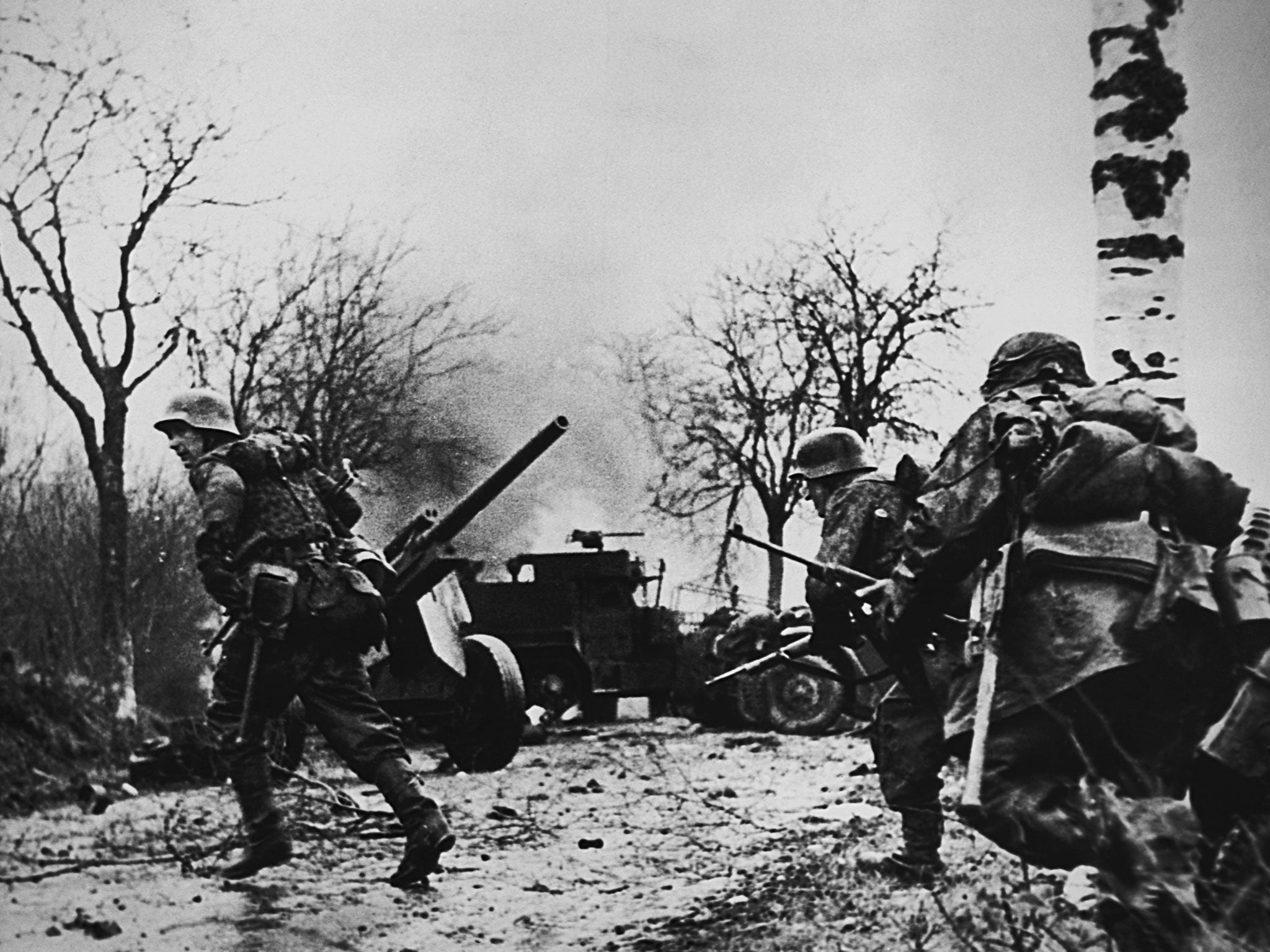 German soldiers advance into Belgium in 1944 during the Battle of the Bulge