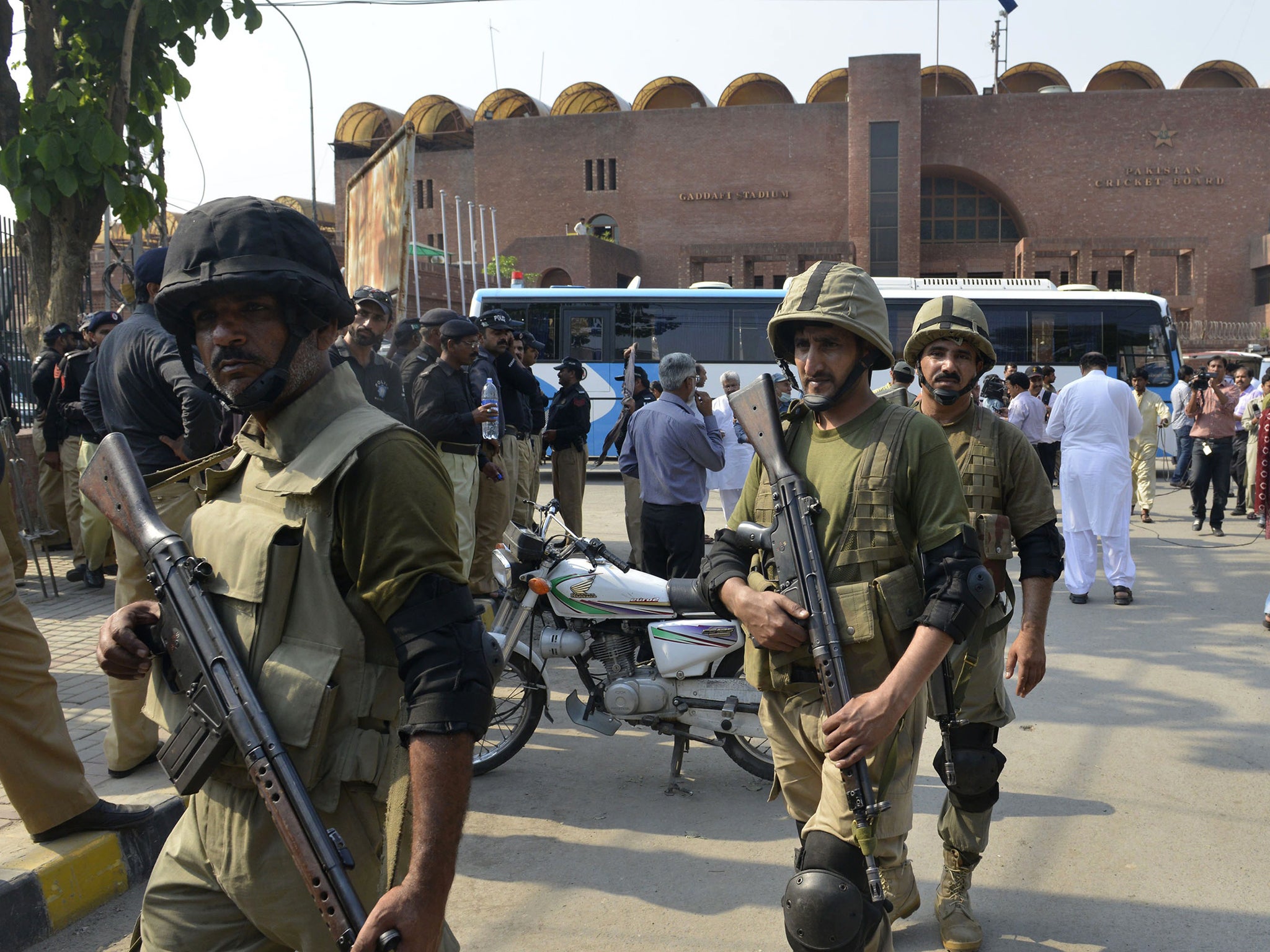 Pakistani Rangers gather for a rehearsal of security arrangements for the Zimbabwe team outside the Gaddafi Cricket Stadium in Lahore