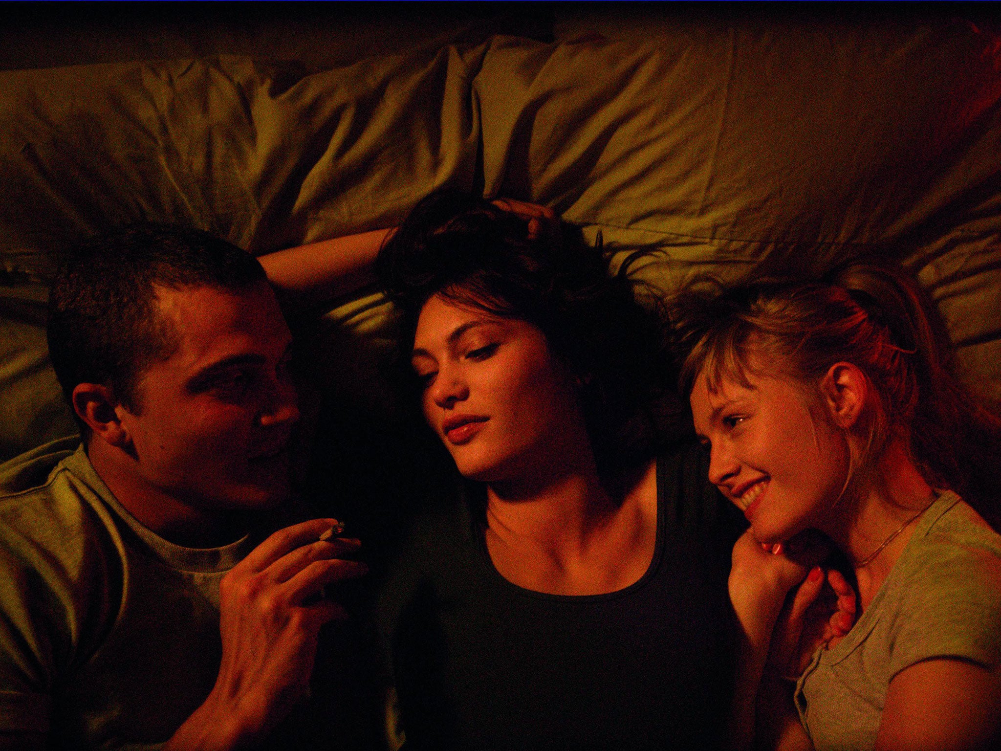 A scene from the film which features a threesome