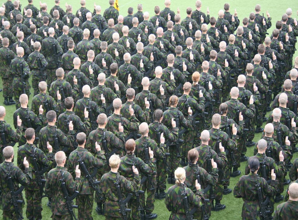 Finnish conscripts giving their military oath after basic training