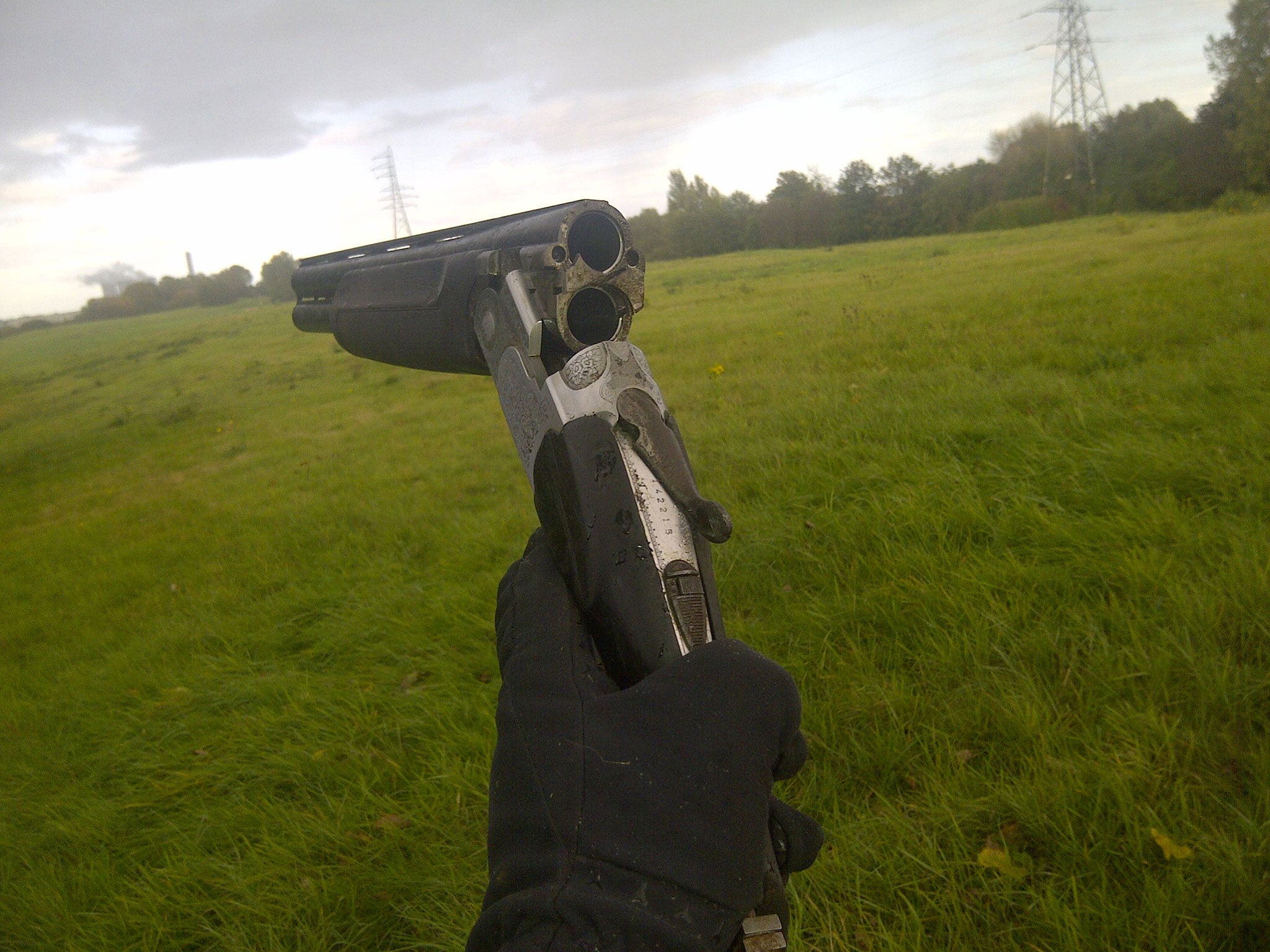 The double-barrelled shotgun was found by ballistic experts under a hedge (credit: Cheshire Police)