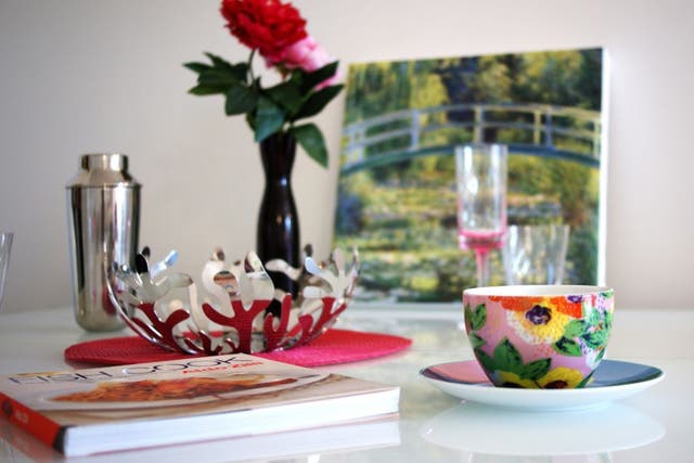 The Beatrix cup and saucer from Oliver Bonas, and House of Fraser plastic flutes
