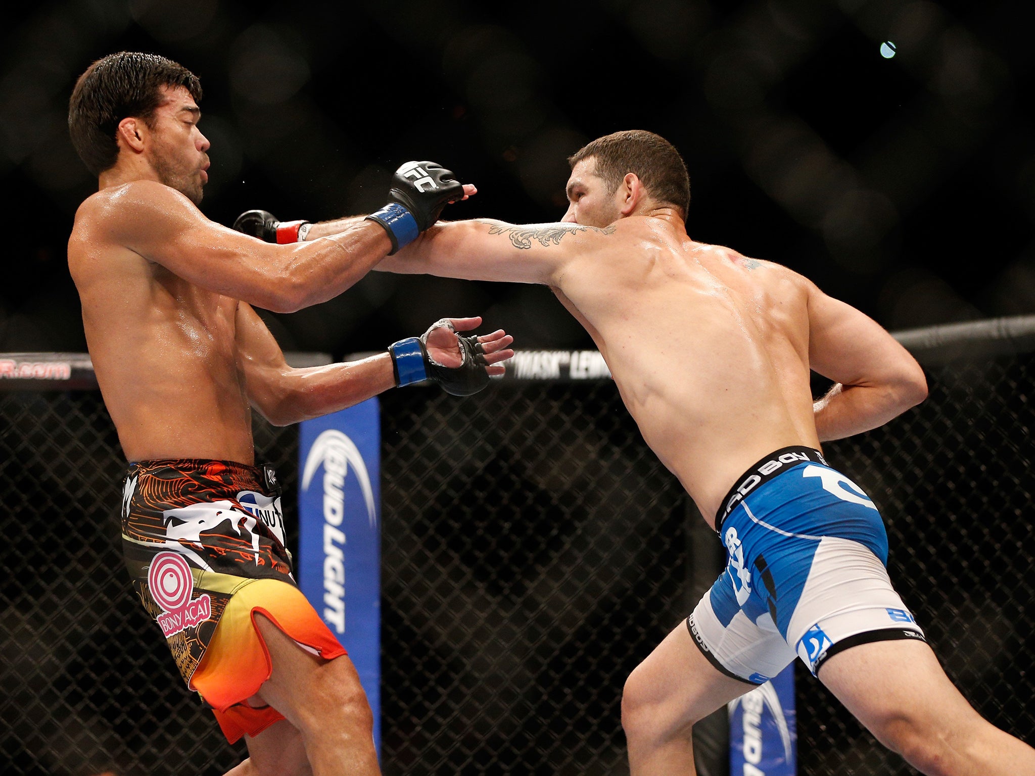 Chris Weidman (right) will defend his middleweight championship against Luke Rockhold