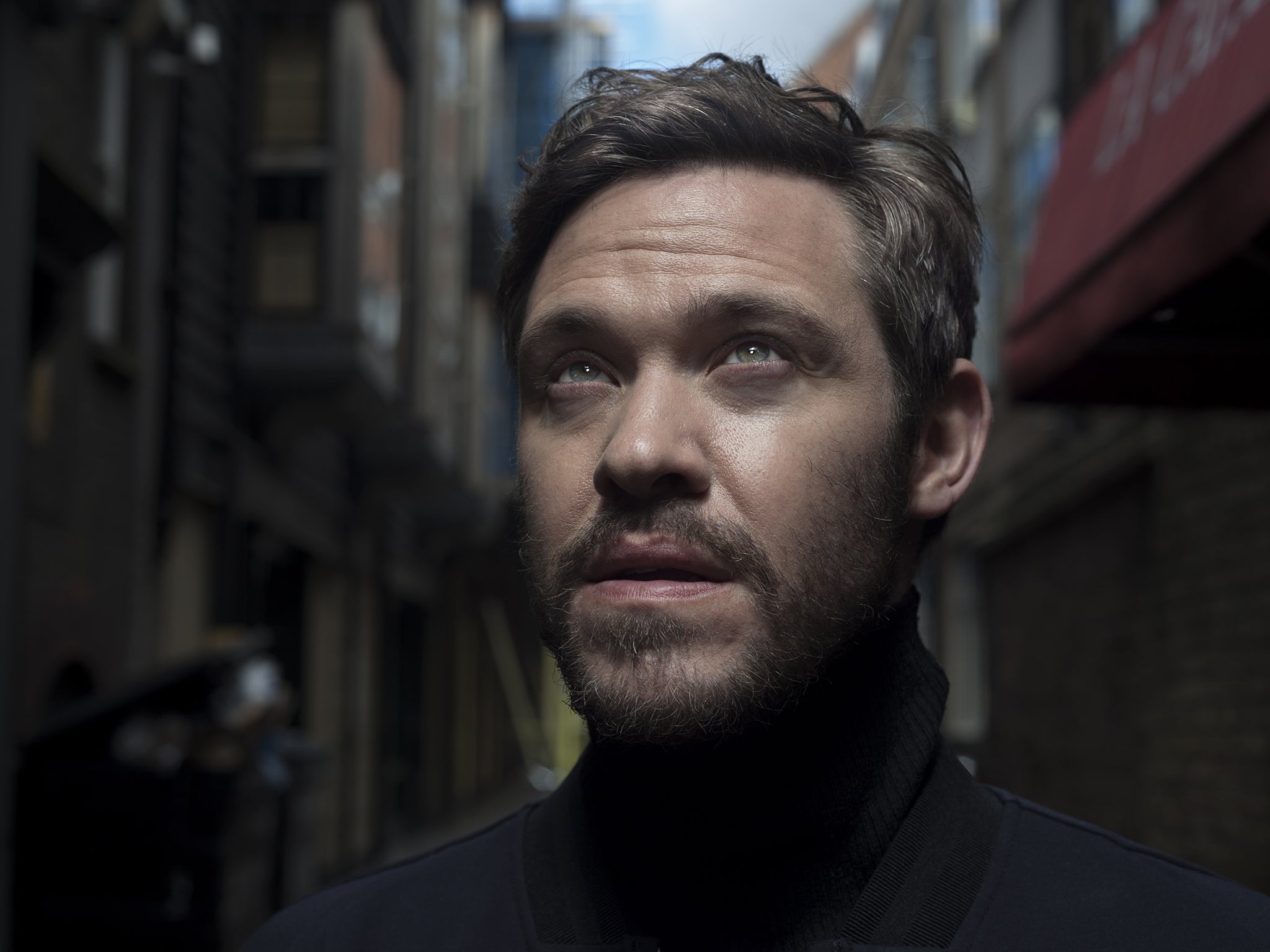 Will Young looking to the skies in Soho to promote new album 85% Proof