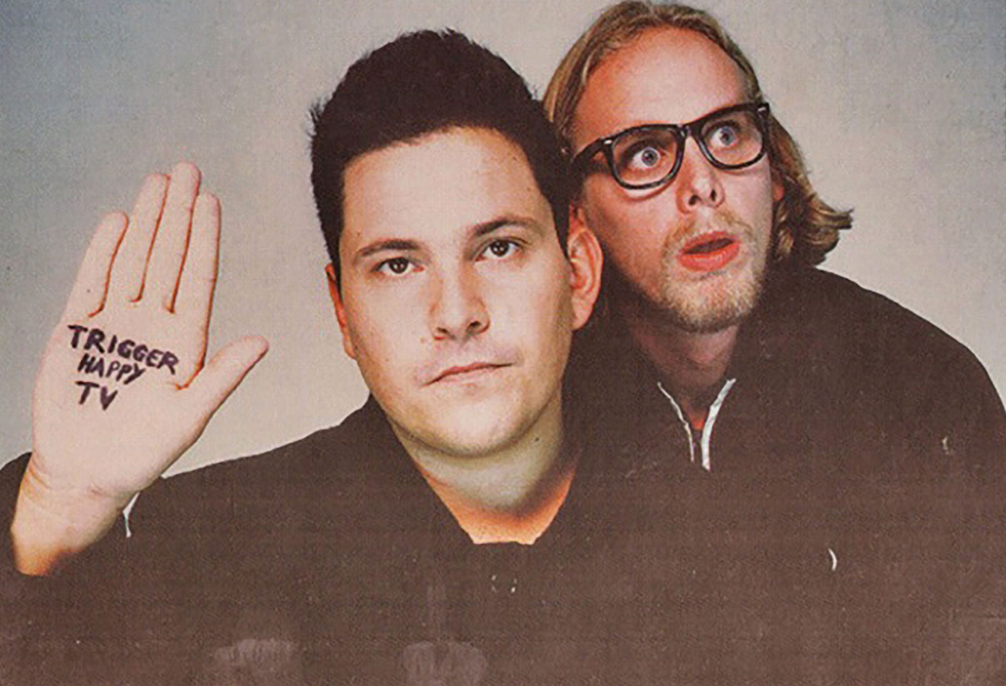 Handy tips: Dom Joly (left) in a promotional image for Trigger Happy TV