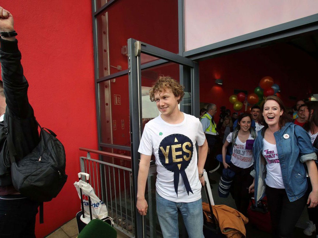 Irish nationals arrive by ferry at Dublin to vote on whether same-sex marriage should become legal