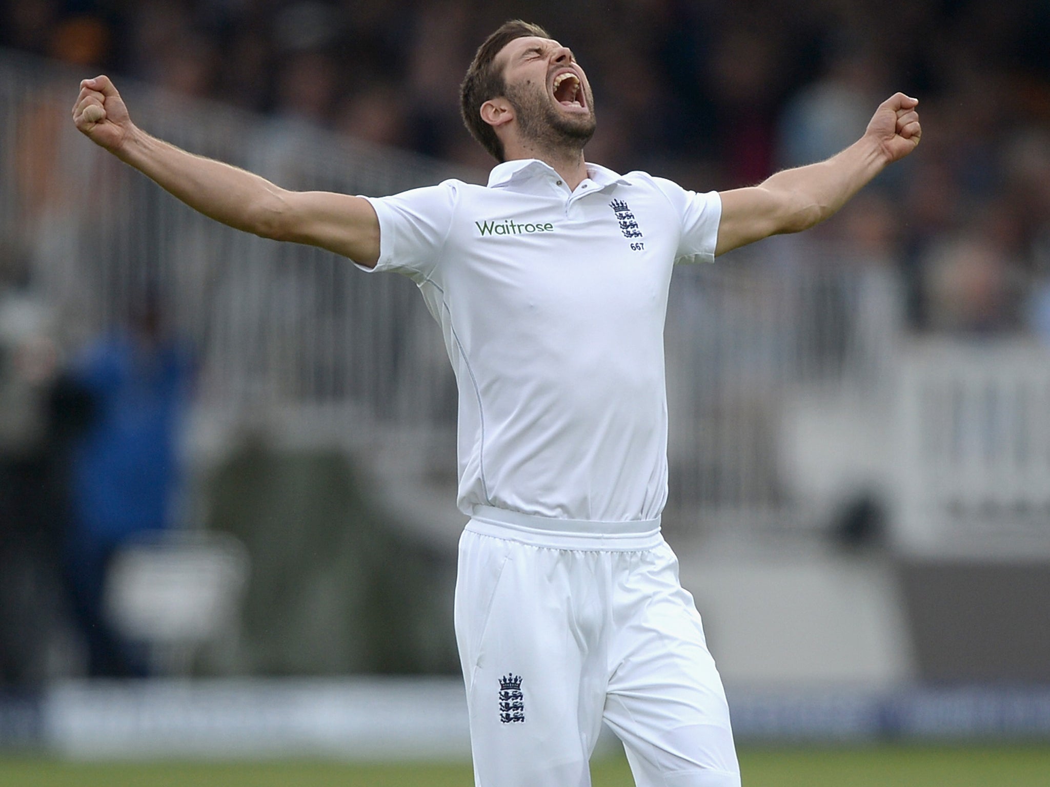 Wood celebrates his maiden Test wicket