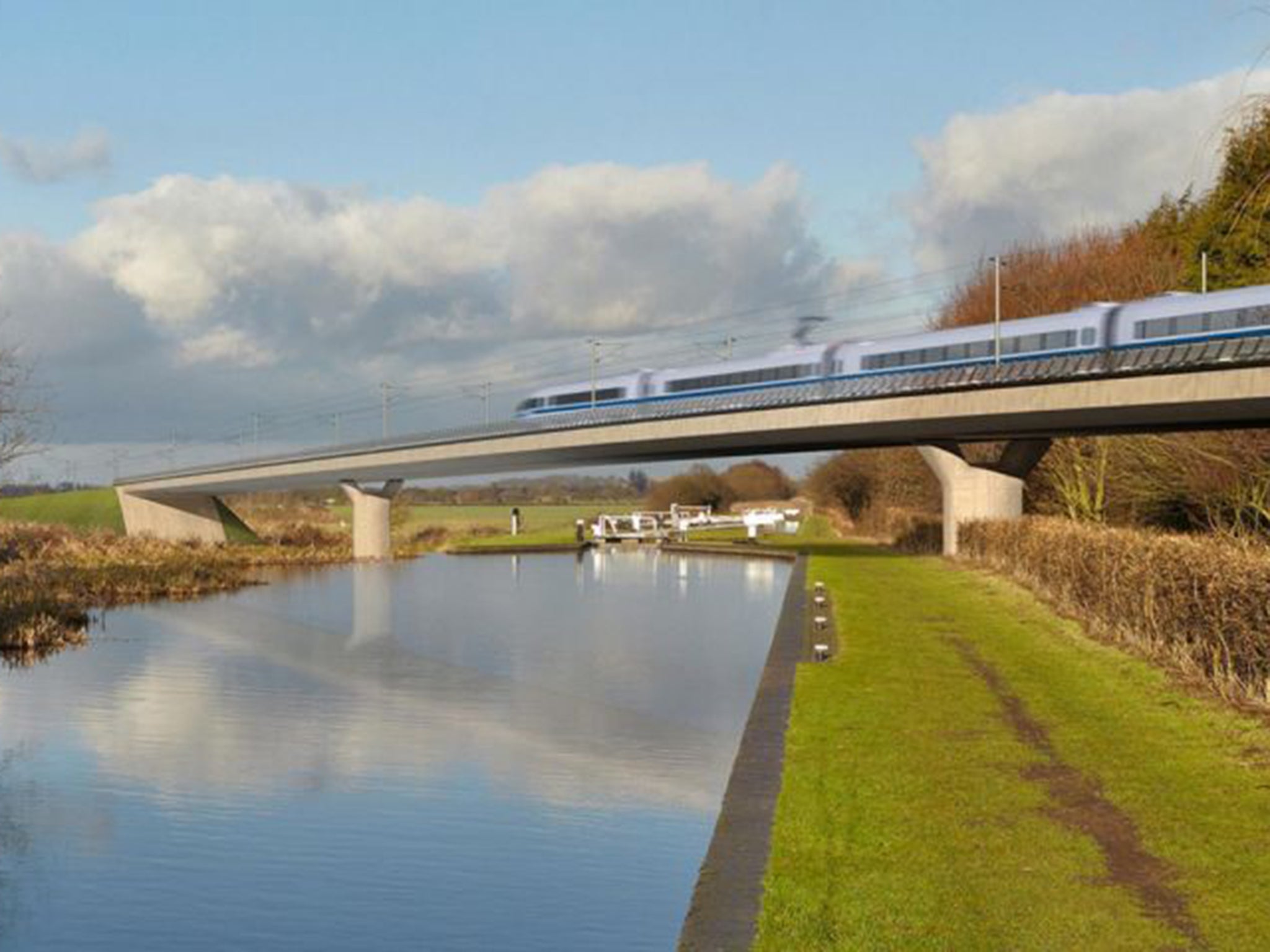An HS2 train crosses a viaduct near Birmingham, in this artist’s impression