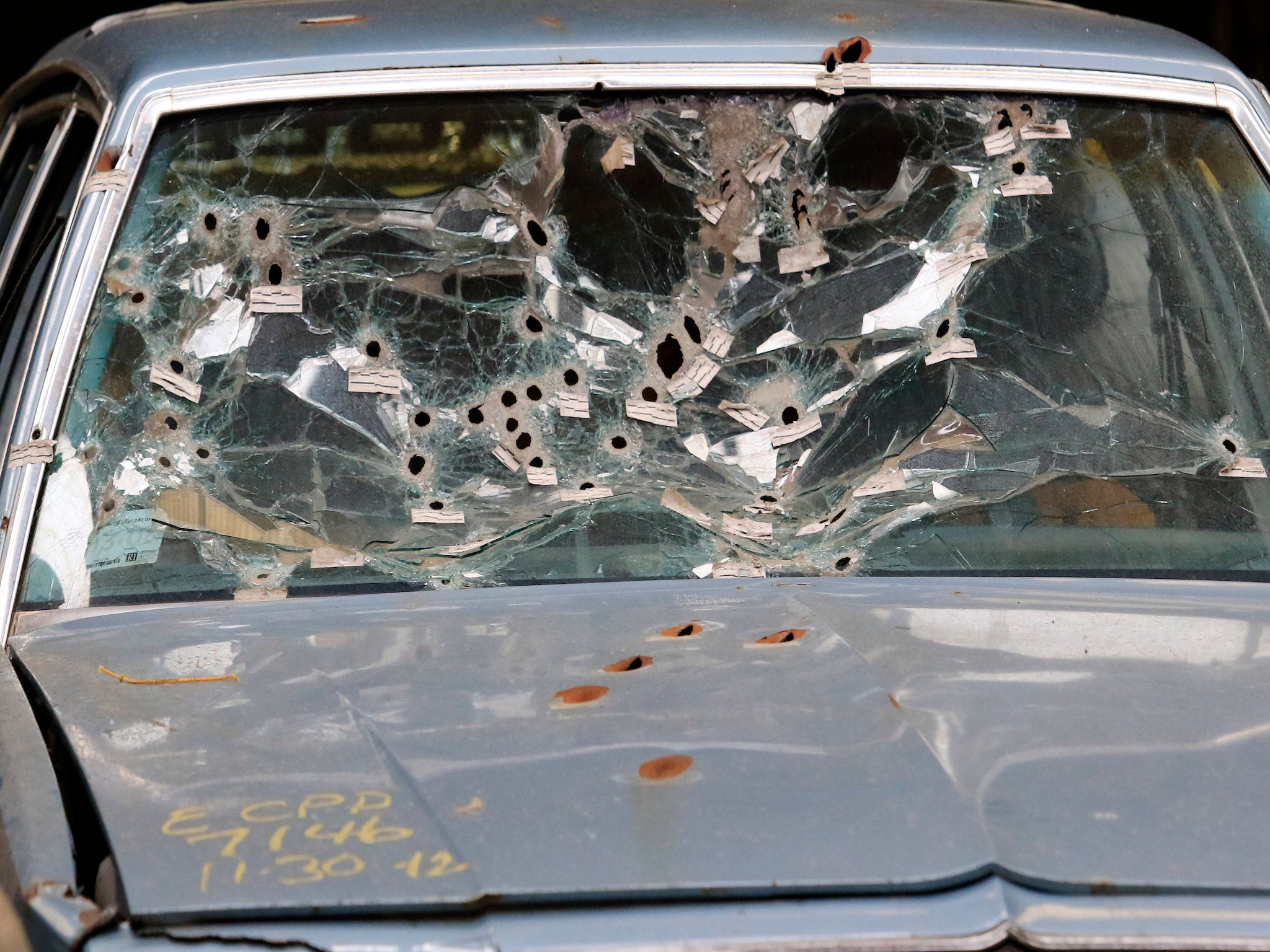 Mr Brelo fired repeatedly through the windshield of Timothy Russell's car