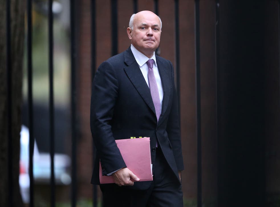 Ian Duncan Smith is believed to have 'pushed back' against the planned £12 billion of cuts to his department