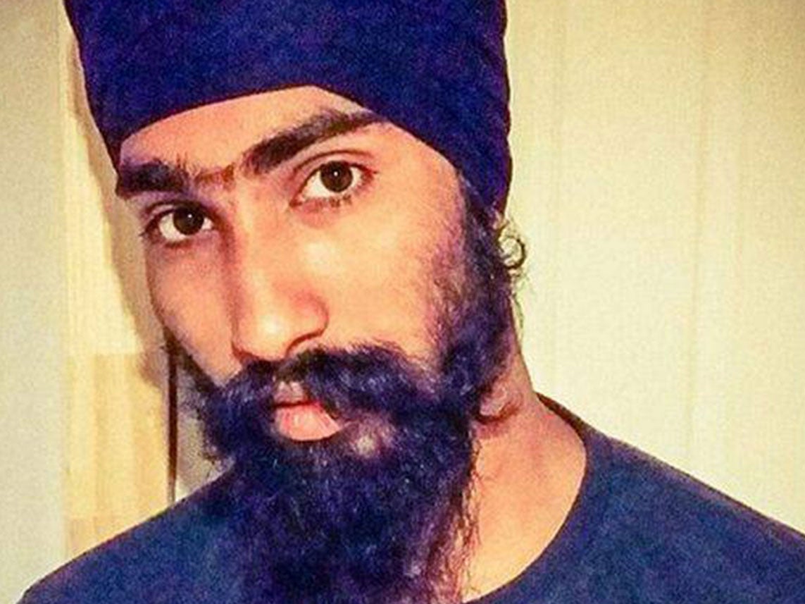 Harman Singh, 22, became internationally famous after a picture of him using his turban to help and injured child went viral.