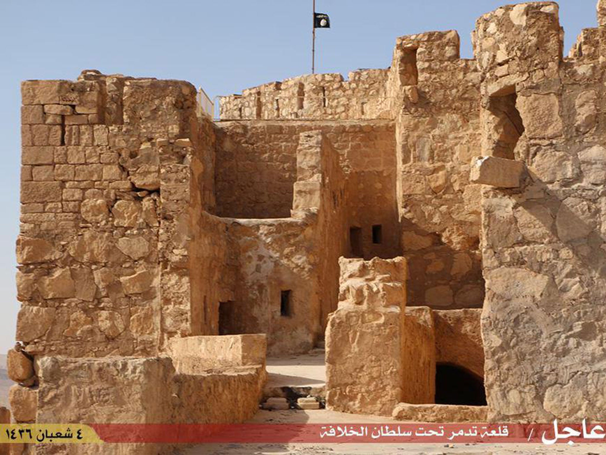 Isis have raised their flag over an ancient ruin in the city of Palmyra