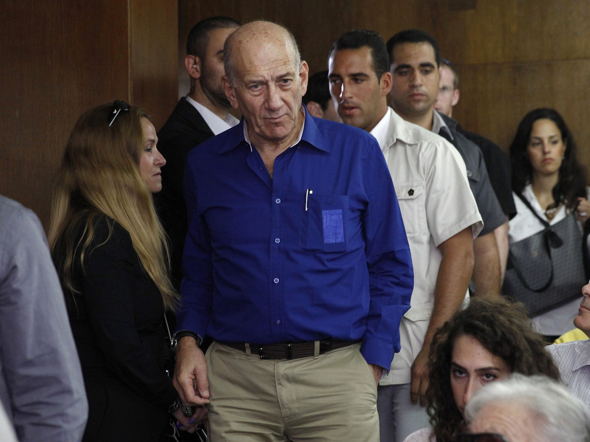 File photo from 13 May, 2014, shows Israel's former Prime Minister Ehud Olmert at the Tel Aviv District Court in Israel