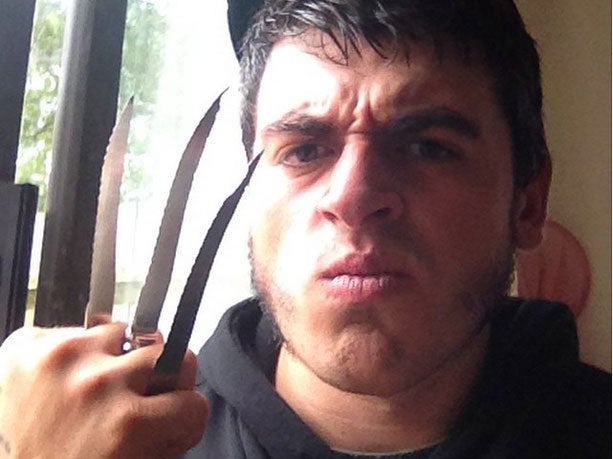 Allen poses with three knives between his fingers, imitating 'Wolverine'