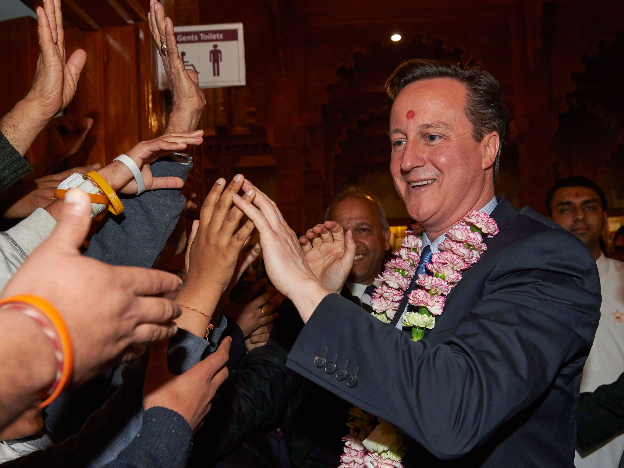 David Cameron vists Neasden Hindu Temple a few days before the election - Hindu voters mostly backed the Conservatives, with 49 percent of them voting Tory, compared to only 41 per cent for Labour.